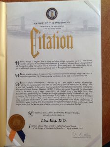 Dr. Lisa Eng receives citation from Borough President Eric Adams